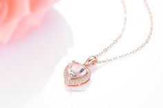 Beautiful Heart-Shaped Morganite Pendant Necklace ►Base Metal: Sterling Silver (925) ►Plating: 14K Rose Gold ►Accented with simulated diamonds (CZ) Center Stone: Morganite Shape: Heart Gemstone creation: Lab-Created Measurements: 9.0 mm Carat Weight: 1.8 ct. (approx.) Hardness: 8 (Mohs scale) ►Matching earrings can be purchased at: https://www.etsy.com/listing/628901014/14k-rose-gold-natural-pink-morganite?ref=listings_manager_grid ►Please be aware that plated jewelry can wear off over time, if Rose Gold Heart Pendant Jewelry In Cubic Zirconia, Rose Gold Cubic Zirconia Heart Pendant Jewelry, Cubic Zirconia Heart Pendant Jewelry For Wedding, Pink Diamond Necklaces For Mother's Day, Elegant Cubic Zirconia Necklace For Anniversary, Rose Gold Diamond Necklace For Anniversary Gift, Diamond Cut Jewelry For Mother's Day Anniversary Gift, Diamond Cut Jewelry For Anniversary And Mother's Day, Heart Cut Halo Setting Jewelry For Wedding