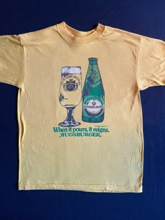 "Vintage beer shirt, cool graphics for a Company that no longer exists.  Clever take off of Morton Salt saying, When it Pours, it reigns AUGSBURGER.  Great beer lovers, beer collector t shirt.  Please note, the shirt is bright yellow as seen in the photo of the label. Excellent vintage condition  Modern size small Label: Fine Apparel T Fine by R & D 50/50 cotton/polyester size M Measurements: Pit to pit: 17\" Length: 24\"" Vintage Beer Tshirts, Eclectic Vintage Fashion, Brewery Merch, Vintage Beer Shirts, Beer Merch, Vintage Tshirt Design, Vintage T Shirt Design, Vintage Shirt Design, Morton Salt