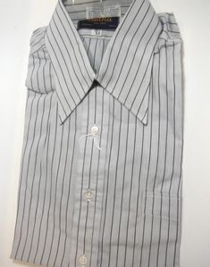 Vintage Sulka gray with black pinstripes, 100% cotton, never worn. Classic Gray Shirt With Spread Collar, Classic Gray Spread Collar Tops, Classic Gray Tops With Spread Collar, Classic Gray Formal Shirt, Classic Gray Top With Spread Collar, Pinstripe Spread Collar Shirt For Office, Pinstripe Shirt With Spread Collar For Office, Office Pinstripe Shirt With Spread Collar, Gray Button-up Shirt For Business