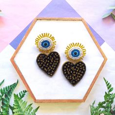 "These large blue evil eye with black heart earrings make the perfect and unique gift for family, friend or yourself. ★ READY TO SHIP Made with love and care for you!♥ ★Dimensions: 7*4 cm (2.75*1.57 inch) ★Colors may vary slightly from photos due to lighting and monitor settings. ★ ESTIMATED DELIVERY TIME: North America: 2-4 weeks Europe: 1-3 weeks Australia, New Zealand and Oceania: 3-5 weeks Asia Pacific: 2-4 weeks Latin America and the Caribbean: 3-5 weeks North Africa and Middle East: 3-5 weeks Sub-Saharan Africa: 3-5 weeks ★ PLEASE NOTE: I accept payments via Paypal * you don't need to have an account * with a credit or debit card. 1. Click \"Pay with PayPal\" and you will be redirected to PayPal. Instead of paying with your PayPal account, select \"Pay with a debit or credit card\". Heart Beaded Earrings, Beaded Heart Earrings, Black Heart Earrings, Jewelry Girl, Evil Eye Beads, Beaded Heart, Handmade Earrings Beaded, Earrings Beaded, Blue Evil Eye