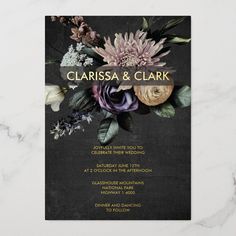 wedding card with flowers and leaves on the front, in gold foil lettering that reads, clarissa & clark