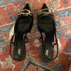 Size 7.5/38 Zara Black Kitten Heel With Gold Detail. Strap Is Not Adjustable Zara Black Heels With Buckle Closure, Gold Kitten Heels, Heels Kitten, Black Kitten Heels, Vintage Heels, Black Kitten, City Vibe, Slingbacks, Zara Shoes