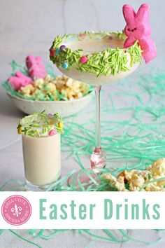 an easter drink with bunny decorations on the rim and in a glass next to it