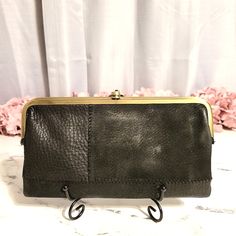 This Unique Rare Hobo Black 'Lauren' Wallet Is Made With 2 Different Fabrics & Gives It A Patchwork Feel. On The Front & Back Is Hobo's Genuine Suede & Pebbled Buttery Leather. On The Inside, Which Is Immaculate, Is Black Pebbled Leather. It Features Hobo's Iconic Antique Brass Hardware & Now Retired Wanderlust Lining, Which Is No Longer Made. The Lauren Features 2 Clasp Side Compartments. One Has A Wall Zipper Pocket & Open Space To Stash Your Needs. The Second Has 6 Card Slots & 2 Slip Pockets. Open The Wallet Up, Which Opens/Closes With 2 Fabric Covered Magnets, & There's An Id Window, 3 More Card Slots, & A Zip Pouch That Runs The Length Of The Wallet, Perfect For Cash Or Perhaps Your Ph Black Leather Rectangular Coin Purse, Black Leather Coin Purse For Everyday, Everyday Black Leather Coin Purse, Black Leather Bags With Card Slots, Black Leather Wallet For Daily Use, Black Textured Leather Clutch For Everyday, Rectangular Leather Coin Purse For Evening, Rectangular Leather Evening Coin Purse, Leather Evening Bags With Card Slots