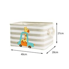 a toy storage box with giraffes on the front and blue truck on the back