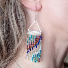 The perfect combination of elegant and fierce! These gorgeous fringe earring kits, designed by Jacquelyn, include 3 sparkly 15 inch strands of 2mm faceted gemstones from Dakota Stones in each kit. The metal triangle frames are the perfect base for these fringe earring designs that are so on trend, yet also timeless. Once completed, these earrings will measure approximately 3.75" long. Kit includes all materials for these earrings along with step-by-step instructions. Tools needed to complete thi Seed Bead Fringe Earrings, Bead Fringe Earrings, Fringe Earring, Bead Fringe, Chain Nose Pliers, Earring Kit, Earring Designs, Beautiful Lady, Beaded Fringe