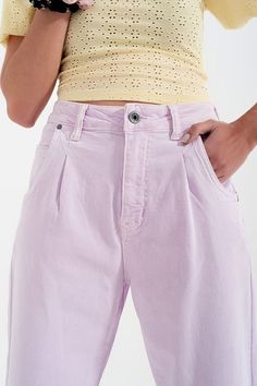 High-waisted, pleated detail at the waistband and at the cuff are in an oh-so trendy lilac hue and in a lightweight comfy fabric. They have pleats in the front and at the ankles. The pockets on the side and back are functional, as are the belt loops. These jeans look fabulous paired with a colorful bodycon or crop top or sweater and a pair of sneakers, mules, or espadrilles. We pair them with our Yellow Short Top in Batiste Fabric with Puffed Sleeves, in our photos. The stretchy fabric is made f Types Of Jeans, How To Hem Pants, High Rise Mom Jeans, Yellow Shorts, High Waisted Jeans, High Rise Denim, Hat Hairstyles, Short Tops, High Waist Jeans