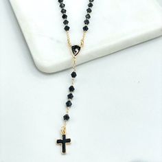 18k Gold Filled Black Beads with Virgin Mary Charm Beaded Necklace Rosary with Black Enamel Cross, Wholesale Jewelry Making Supplies.Rosaries Size:-Length: 18 inches : Thickness: 1mm | Beads: 3mm | Cross: 15mm x 9mm | Virgin Maria: 12mm x 11mm Black Beaded Necklace With Adjustable Chain As Gift, Black Beaded Lariat Necklace Gift, Black Beaded Lariat Necklace, Spiritual Black Lariat Necklace, Black Beaded Chain Lariat Jewelry, Gold Crystal Necklace With Black Beads For Gift, Gold Crystal Necklace With Black Beads As Gift, Virgin Maria, Enamel Cross