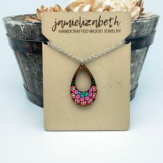 Add a touch of whimsy to your wardrobe with our handpainted Flower Burst set!! These unique earrings or necklace feature intricate mandala designs, adding a pop of color and fun to any outfit. Size: Large: 2.2in Medium: 1.6in. Small 1.2in Pendant necklace comes on a 24in chain. *Hooks are nickel-free and hypoallergenic! Intricate Mandala, Mandala Designs, Handcrafted Wood, Wood Jewellery, Mandala Design, Unique Earrings, Color Pop, Hand Painted, Pendant Necklace