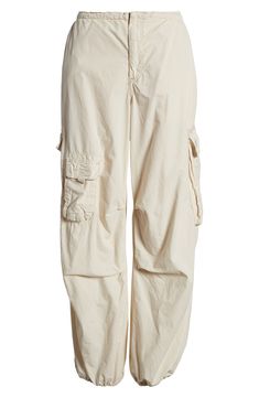 Bungee cords at the waist and cuffs let you adjust the fit of roomy cotton cargo joggers equipped with a mix of utility pockets. Exclusive retailer 30 1/2" inseam; 20" leg opening; 9 1/2" front rise; 15 1/2" back rise (size Medium) 100% cotton Machine wash, line dry Made in Turkey Relaxed Fit Cargo Pants With Cuffed Ankles, Cargo Pants With Cuffed Ankles And Pockets, Cotton Cargo Bottoms With Cuffed Ankles, Cotton Cargo Pants With Cuffed Ankles, Cotton Pants With Cargo Pockets And Cuffed Ankles, Utility Cotton Cargo Pants With Cuffed Ankles, Tech Cargo Pants, Bungee Cords, Bdg Urban Outfitters