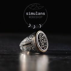 Crafted with an artful touch, the "Timeless Wisdom Oval Signet Ring" is a sophisticated piece that encapsulates the essence of resilience and the enduring human spirit. Embracing the intricate art of engraving, this ring boasts a central motif adorned with the uplifting inscription 'buda geçer yahu', a Turkish adage meaning 'this too shall pass' - a timeless reminder that all experiences, good and bad, are fleeting. The sides of the ring are embellished with fine micro gemstones, adding a touch Ceremonial Oval Engraved Ring With Polished Finish, Timeless Oval Dome Ring As Gift, Timeless Oval Dome Ring For Gift, Luxury Carved Oval Signet Ring, Formal Oval Engraved Ring With Etched Details, Oval Engraved White Gold Ring For Ceremonial Occasions, Luxury Oval Engraved Carved Ring, Oval White Gold Engraved Ring For Ceremonial Occasions, Oval White Gold Engraved Ceremonial Ring