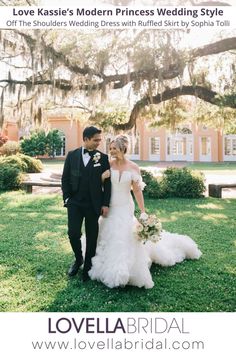 a bride and groom standing in front of a large tree with spanish moss hanging from it's branches