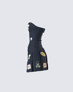 Bad b*tch vibes only 😜 Always be one step ahead of them in this navy pinstripe dress made from suiting fabric and complete with a fit & flare style, cute patches, and a pleated skirt 🖤 Preppy Fitted Dresses For Work, Strapless Ruffle Dress, Suiting Fabric, Cute Patches, Black Off Shoulder, Pinstripe Dress, Suit Fabric, White Jersey, Dark Fashion