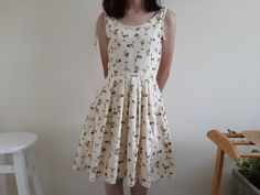 "Cream Tie Strap Cocktail Glass Print Dress - Canvas fabric - Invisible nylon zipper up back - Fixed waist - Fully lined - Pleated skirt - Ready to ship in 1-3 business days Measurements : Bust : 36\" Waist : 28\" Hips : free Length : 36.5\" Shoulder to waist : 15.5\" Model height : 5'6\" bust : 33\" waist : 25\" hips : 35\" Please read the policies tab before purchase. I can't have a model for clothes of all sizes, but I have already clearly written a model size. If you have questions about the Womens Summer Dress, Canvas Dress, Yellow Striped Dress, Summer Sundress, Full Skirt Dress, Dress Pleated, Pin Up Dresses, Scoop Neck Dress, Dress Pin