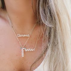 The RIAVA DIAMOND SCRIPT Name Necklace features the name of your choice in a dainty script font with handset diamonds. A 6 character name measures approximately 1" width and 1/4" height. Please note that the starting price applies to a 2-letter name, each additional letter features an up-charge. Due to its custom nature, please allow 4-5 weeks for this item to ship. Gold Diamond Name Necklace, Gold Nameplate Necklace With Diamond Accents, Gold Initial Necklace With Name, Sterling Silver Diamond Necklace With Initials, White Gold Initials Name Necklace, Engraved Nameplate Charm Necklaces, Gold Sterling Silver Name Necklace With Diamond Accents, White 14k Gold Nameplate Necklace, Personalized Diamond Name Necklace In White