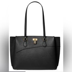 Taking The Classic Tote To A New Level, The Ruby Large Zip-Top Leather Tote By Michael Michael Kors Lends Sophistication To Practicality. Large Sized Bag; 15"W X 10-3/4"H X 5-3/4"D (Width Is Measured Across The Bottom Of Handbag); 1.79 Lbs. Approx. Weight Silhouette Is Based Off 5'9" Model 11"L Handles Zip-Top Closure Elegant Bags With Branded Hardware For Work, Elegant Bags For Work With Branded Hardware, Elegant Office Bags With Branded Hardware, Designer Bags With Magnetic Closure For Work, Designer Work Bags With Magnetic Closure, Designer Clutch Bag For Work, Elegant Shoulder Bag For Work With Branded Hardware, Elegant Workwear Shoulder Bag With Branded Hardware, Elegant Work Bags With Magnetic Closure