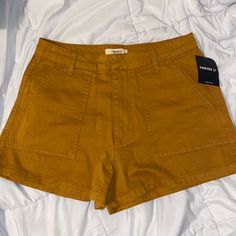 Never Worn Cargo Like Material Size 28 Summer Shorts Check Out My Closet I Have Tons Of Nwot/Nwt Items Posted Bundle To Save Some Brands In My Closet American Eagle Outfitters, Charlotte Russe, Forever 21, Abercrombie And Fitch, Zara, H&M, Hollister, Converse, Toms, Heels, Levi’s, Boohoo, Maurice’s, Adidas, Under Armour Brown Summer Cargo Shorts, Summer Brown Cargo Shorts, Brown Cargo Shorts For Summer, Forever 21 High-waisted Shorts With Pockets, Forever 21 Shorts With Pockets, Forever 21 Short Bottoms With Pockets, Brown Jean Shorts With Pockets For Summer, Forever 21 High Rise Cotton Shorts, Forever 21 Casual Shorts With Pockets