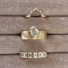 three different types of wedding rings on display