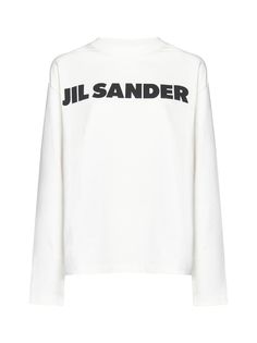 Jil Sander’s white cotton long-sleeved t-shirt featuring a ribbed crew neck, logo printed on the chest and dropped shoulders.Size Type: InternationalGender: WomenMaterial: NATURAL (VEG)->COTTON100 %Color: BeigeMade in: ITProduct ID: J02GC0107J45148102*Import tax/duty will be calculated at checkout (If applicable) Casual White Turtleneck T-shirt, Logo Crew Neck Top For Fall, Sporty White Turtleneck Top, White Winter T-shirt With Logo Print, Sporty Long Sleeve Tops With Logo, Sporty Logo Tops For Fall, White Sporty Tops With Logo Lettering, Sporty White Tops With Logo Lettering, White T-shirt With Ribbed Cuffs For Spring