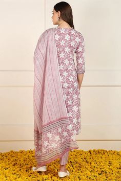 Grab this beautiful 3-piece set. The set comes with floral print straight shape kurta has round neck, 3/4th sleeves & calf length teamed with printed trouser pant with single pocket and a printed dupatta. Color - Pink Kurta Fabric-Cotton Pant Fabric-Cotton Dupatta Fabric - Cotton Neck-Round Neck Sleeves-3/4th Sleeves Work -Floral Print Detailing Washing Instructions-Dry Clean DISCLAIMER - The color of the product may be differ due to screen settings of device. A misprint here and a color drop slip there is the beauty of printing which is not treated as a defect. Spring Straight Kurta Sets With Printed Motifs, Spring Pant Set With Straight Kurta And Printed Motifs, Spring Pant Set With Printed Motifs And Straight Kurta, Spring Floral Print Cotton Pant Set, Floral Print Cotton Pant Set With Long Sleeves, Fitted Cotton Pant Set With Printed Motifs, Spring Straight Kurta With Printed Border, Fitted Floral Print Unstitched Cotton Suit, Spring Festive Sets With Printed Border