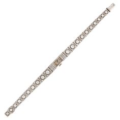 a diamond bracelet on a white background