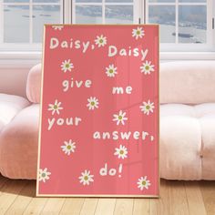 a pink poster with daisies and the words daisy, daisy give me your answer do