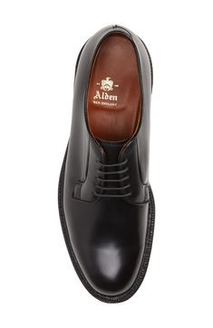 This plain-toe derby made from smooth leather has been hand stained and polished to a classic patina, a hallmark of Alden of New England. Lace-up style Cushioned footbed with arch support Water-resistant Leather upper, lining and sole Made in the USA Men's Shoes Vintage Preppy, Up Styles, Arch Support, Smooth Leather, New England, Hallmark, Derby, What To Wear, Dress Shoes Men