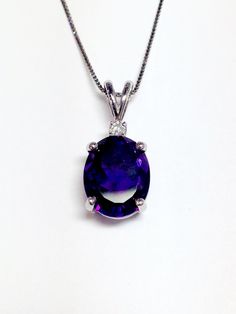 "Up for sale is a Beautiful 14K White Gold Oval Shape Amethyst Gemstone Diamond Necklace Pendant. This classic Pendant features Genuine Amethyst Gemstone. The stone is prong set in solid 14 Karat White Gold. An 18\" inch 14K White Gold 1 gram chain is included. Specifications: -Model #: JK385 -Metal Type Available: White Gold, Rose Gold, Yellow Gold -Metal Purity: 14K -Stone Size: 9 MM x 7 MM (Approximate weight 2.00 Carats) -Height: 5.5 MM -Gold Weight: 1.3 Grams -Total Diamond Weight: 0.05 car Diamond Necklace Pendant, White Gold Diamond Necklace, Dancing Diamond, Necklace Extender, Solitaire Pendant Necklace, Sterling Necklaces, Gold Diamond Necklace, Champagne Diamond, Fine Jewels