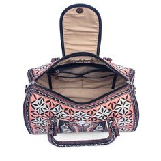 Our stunning cross-body bag is ready to have you turning heads. The intricate embroidery, featuring traditional Indonesian designs lends to its beauty, while its generous size makes for a gorgeous everyday handbag. The Nano Bag is not only beautiful, but it's 100% cruelty-free. Whether you are vegan or looking for ethical and artisanal-made, the Nano Bag is a top choice for the conscious consumer. 
      Snap button closure on the exterior front.  Three pockets including one zippered in the cott Luxury Embroidered Travel Bags, Luxury Embroidered Crossbody Bag, Artisan Style Bag With Removable Pouch, Traditional Crossbody Satchel For Everyday Use, Traditional Top Handle Bag With Removable Pouch, Artisan Travel Bag, Traditional Embroidered Shoulder Bag For Travel, Traditional Satchel For Travel, Traditional Top Handle Shoulder Bag