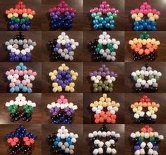 many different colors of beads are arranged in the shape of an x on a table