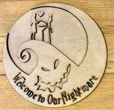 a wooden plaque with the words welcome to our nightmarr and an image of a skeleton