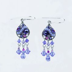 As whimsical and magical as your favorite constellation, the artisan-made dangling Firefly Mosaic Sapphire Earrings will bring a touch of sparkle and starlight to all of your favorite looks. They're delicate enough to be demure but unique enough to start a conversation: the perfect combination! • Sterling silver ear wires; setting is silver-plated antiqued steel• Clean with a soft jewelry polishing cloth. Never clean with any chemicals, chlorine, or bleach. To avoid damaging the finish, apply pe Soft Jewelry, To Start A Conversation, Big Earrings, Sapphire Earrings, Polish Jewelry, Firefly, Czech Glass Beads, Chandelier Earrings, Vintage Earrings