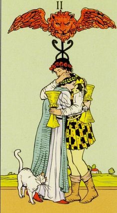 a tarot card with an image of two people hugging