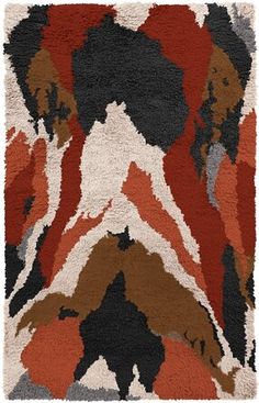 an abstract rug with various colors and shapes on it, including black, brown, white, red, orange and grey