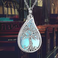 This elegant Tree of Life Teardrop Cremation Necklace combines the powerful symbolism of the Tree of Life with the shape of a teardrop, symbolizing eternal life, immortality, and reincarnation. The necklace is designed to keep the memory of a loved one close to your heart at all times. Design Symbolism: The Tree of Life represents eternal life, growth, and strength, making it a profound symbol of remembrance and continuity. The teardrop shape adds a poignant element, symbolizing love and loss. E Shell Tree, Cremation Necklaces, Urn Necklace, Urn Necklaces, Cremation Jewelry, Eternal Life, Abalone Shell, Tree Of Life, Pendant Necklaces