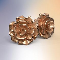 Elevate your style with our exquisite rose-shaped gold stud earrings, meticulously crafted in Italy from genuine 14k or 18k gold. Delicate yet striking, these earrings add a touch of luxury to any ensemble. Experience Italian craftsmanship at its finest with these timeless treasures. 14k or 18k gold Shape size: 9mm x 9 mm Made in Italy Rose Gold Jewelry With Roses For Formal Occasions, Elegant Roses Shaped Jewelry, Formal Rose Earrings With Rose Design, Formal Rose Gold Earrings With Rose Design, Yellow Gold Earrings With Rose Design For Gift, Yellow Gold Rose Design Earrings As Gift, Elegant Formal Jewelry With Rose Details, Yellow Gold Earrings With Rose Design As Gift, Rose Flower-shaped Elegant Earrings