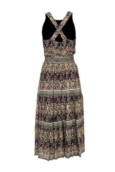 Take the floral trend into autumn with this dress from Sea NY! A rich brown and yellow floral print makes this bohemian-inspired piece perfect for those transitional months. Pair with sandals and a hobo bag, or wear with booties and a jean jacket on those chilly fall days. Size 4 Shell: 100% Viscose Lining: 100% Polyester Concealed side zipper Lined Maxi, tiered silhouette Scoop neckline Sleeveless Crisscross design on back Floral print design Bust 34" Waist 30" Shoulder to hem 53" Brown Printed Maxi Dress For Summer, Hippie Brown Floral Print Dress, Flowy Brown Printed Maxi Dress, Brown Floral Print Maxi Dress For Vacation, Sleeveless Brown Floral Print Maxi Dress, Sleeveless Brown Floral Maxi Dress, Brown Floral Print Sleeveless Maxi Dress, Brown Floral Print Maxi Dress For Spring, Spring Floral Print Brown Maxi Dress