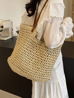 In Stock Fast Shipping From Los Angeles This tote bag will have you feelin' like a jetsetter! The Elena Handbags Straw Woven Tote Bag is a timeless piece to add a touch of elegance to your everyday style. Featuring a simple straw woven design, the bag is versatile enough to carry your everyday essentials, no matter the 'occasion(al situation)! Magnetic button closureDimensions: 12.5"H x 15"WStrap drop length: 11 inches Designer Style ID: 8656 Straw Woven Tote Bag, Retro Vibes, Summer Bag, Everyday Shoulder Bag, Beach Bag Neutral Tote Bag, Elegant Summer Bags, Everyday Shoulder Bag, Summer Vision, Accessory Inspo, Trendy Products, Totes Bag, Woven Tote Bag, Raffia Bag