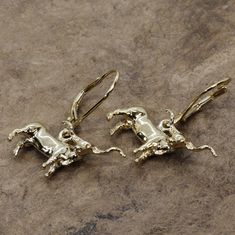 "Beautiful Texas Longhorn Jewelry Design of Gold Longhorns Dangle Earrings Texas Longhorns Dangle Earrings in 14kt Yellow Gold Vermeil. She will love wearing these fully three dimensional Texas Longhorns Steer Earrings. They are three dimensional and dangle below the ears so they will show up the details from all angles. These dangle on 14kt gold vermeil comfortable and secure lever backs. This is a fully three dimensional 14kt Solid Yellow Gold design with a very nice set of horns. I hand carve Texas Longhorn, Texas Longhorns, Themed Jewelry, Football Game, Photo Bracelet, 925 Jewelry, Star Charms, Schmuck Design, Gold Design