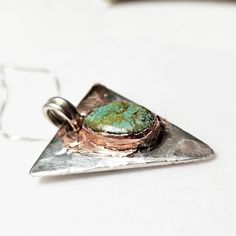 Royston Turquoise Set In Pure Copper Fused To Hammered .999 Fine Silver Sourced From Minted Bullion. Sterling Silver Jump Ring, Hanging On .925 Sterling Silver 16" Box Chain . Hammered Necklace, Royston Turquoise, Pure Copper, Box Chain, Jump Rings, Fine Silver, Womens Jewelry Necklace, Jewelry Necklaces, Copper