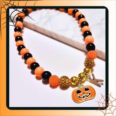 Embrace the Halloween spirit in personalized fashion with our handcrafted beaded initials necklace. This necklace featuring vibrant acrylic orange and black beads along with metallic charms including an initial pendant and an adorable pumpkin charm. Strung on a high-quality stretch cord for a comfortable and customized fit, this necklace enhances any Halloween ensemble for all ages.   Perfect for trick-or-treating, Halloween parties, and outfit coordination. Order yours today to capture the esse Beaded Initials, Halloween Pendant Necklaces With Adjustable Chain, Halloween Black Jewelry With Charms, Unique Handmade Halloween Necklaces, Multicolor Beaded Halloween Jewelry, Halloween Themed Pendant Necklace With Charms, Outfit Coordination, Initials Necklace, Jewelry Halloween