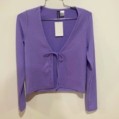 Nwt H&M Purple Cardigan Size: S Good Condition Never Worn Tags Attached H&m Long Sleeve Fall Cardigan, H&m Long Sleeve Cardigan For Fall, H&m V-neck Sweater For Spring, H&m Fitted Spring Sweater, H&m Fitted Sweater For Spring, H&m Fitted Long Sleeve Cardigan, Fitted H&m Winter Cardigan, Casual H&m V-neck Cardigan, Fitted H&m Sweater For Spring