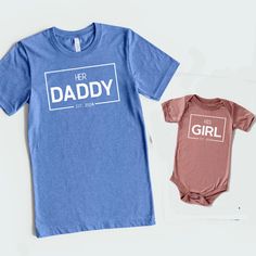 Get ready to celebrate Father's Day in style with these adorable Daddy and Me shirts! This matching set includes a Father Daughter shirt, perfect for creating precious memories together. These family matching outfits are a great way to show your love and appreciation for Dad on his special day. Whether you're looking for a unique Fathers Day gift or just want to surprise Dad with a thoughtful gesture, these shirts are sure to make him smile. Make Father's Day extra special with these cute and co Customizable Blue Tops For Family Occasions, Blue Tops With Text Print For Father's Day, Cute Blue Shirt For Gift, Cute Blue Tops For Family Occasions, Cute Blue Shirt As A Gift, Cute Blue Shirt As Gift, Cute Father's Day Shirt With Crew Neck, Cute Crew Neck Shirt For Father's Day, Blue Family Matching Tops For Father's Day