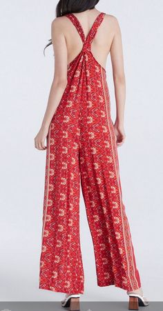 "This Jumpsuit is summer weather must-have! this cute one piece is perfect for throwing on with heels for a night out or pairing with flats and a denim jacket for a pretty daytime look. *loose fit *Fabric soft lightweight mix cotton ONE SiZE Fit US size 4-12 (Small-Medium) Bust upto 40\" Waist 45\"Hip 48 \" full Length shoulder to ankle 58\" CARE * Hand wash with cold water and air dry." Hippie Sleeveless Jumpsuits And Rompers For Spring, Sleeveless Jumpsuits And Rompers For Festivals, Retro Summer Floral Jumpsuits And Rompers, Hippie Summer Jumpsuits And Rompers For Vacation, Summer Vacation Hippie Jumpsuits And Rompers, Sleeveless Bohemian Jumpsuits And Rompers For Beach Season, Hippie Style Summer Vacation Jumpsuits And Rompers, Patterned Sleeveless Jumpsuits And Rompers For Spring, Sleeveless Bohemian Jumpsuits For Beach Season