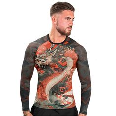 a man with tattoos on his body wearing a red and black dragon tattoo t - shirt