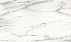 a white marble textured background with black accents