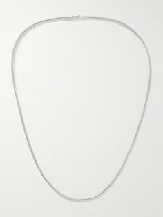 Loren Stewart's 'Serilda' necklace is handmade from sterling silver and comprised of a simple and incredibly delicate snake chain. The tubular shape is hollowed out, giving it a barely-there feel. Wear it daily as part of your signature stack. Silver Minimalist Herringbone Necklace With Box Chain, White Gold Sterling Silver Snake Chain Necklace, Minimalist Snake Chain Necklace With Sterling Silver Clasp, Silver Minimalist Herringbone Necklace, Elegant White Gold Sterling Silver Snake Chain Necklace, Minimalist Metal Snake Chain Necklace, Minimalist Sterling Silver Snake Chain Jewelry, Minimalist White Gold Necklace With Sterling Silver Clasp, Minimalist White Gold Snake Chain Jewelry