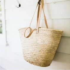 A lovely, woven straw bag with leather handles? - the perfect, practical, authentic accessory for any woman! Elevate your everyday and use it for toting laundry, as an eco-friendly shopping bag, for packing picnic lunches during swimming lessons - or for the beach! This versatile Moroccan basket is ethically handcrafted with natural straw and leather. ethically handcrafted in Morocco Size:11.8 x 19.7 x 13.8 in (30 x 50 x 35 cm). Dimensions are approximate. Eco-friendly Product materials: organic Spring Bucket Straw Bag For Everyday Use, Everyday Spring Bucket Straw Bag, Everyday Spring Bucket Shaped Straw Bag, Spring Everyday Bucket Straw Bag, Everyday Straw Bag With Braided Handles In Bucket Shape, Everyday Straw Bag With Braided Handles And Bucket Shape, Eco-friendly Tote Straw Bag With Leather Handles, Spring Straw Bag With Handles In Bucket Shape, Spring Straw Bucket Bag With Handles