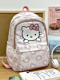 Carry your essentials in this adorable backpack that showcases a playful Hello Kitty design. The spacious compartments and durable construction make it both cute and practical for daily use, adding a touch of fun to your outfit. Kawaii aesthetic Sanrio characters: hello kitty, kuromi, cinnamoroll, pochacco, my melody, pompompurin Zip closure Side water pocket Laptop, tablet pocket inside Size: length 30cm (11.81inch), height 43cm (16.92inch) Sanrio Backpack, Fall Sweaters For Women, Hello Kitty Kuromi, Kitty Items, Crop Pullover, Denim Hoodie, Couture Style, Kuromi Cinnamoroll, Jogger Pants Casual