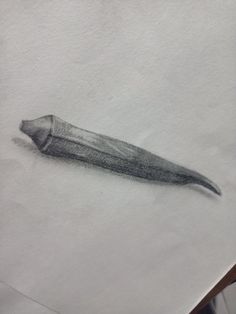 a pencil drawing of a toothbrush on paper